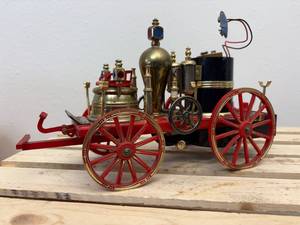 lot 13 image: Working novelty radio modeled after the Mississippi 1869 horse drawn fire engine