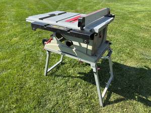 lot 28 image: Craftsman 10 inch 4.4hp collapsible, portable table saw model, 137.218300