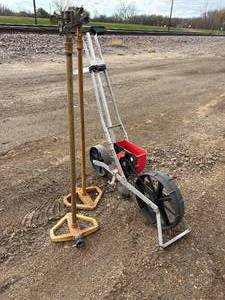 lot 31 image: One Earthway precision garden seeder and two elevated garden sprinklers