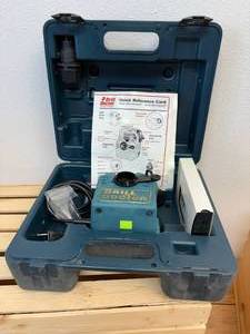 lot 52 image: Drill Doctor drill bit sharpener and storage case