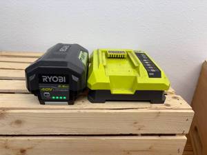 lot 54 image: Ryobi 40 V rechargeable lithium battery with charger