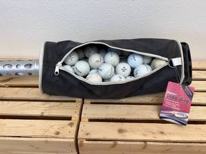 lot 56 image: Golf shag bag filled with golf balls
