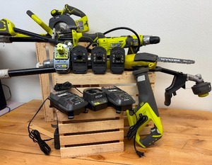 lot 44 image: 18 V lithium Ryobi lot 4 Batteries, 3 Chargers and 7 Tools (Drill, Branch Trimmer, Greaser, Circular Saw, Precipitating Saw, Weed Wacker