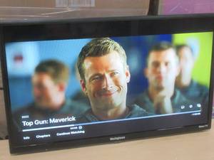 lot 3 image: 24 Inch Westinghouse  LED Roku Smart TV WR24HT2212