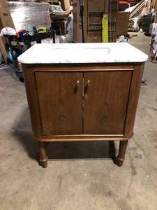 lot 7 image: Bathroom Vanity Broken Granite Top Broken Customer Returns See Pictures