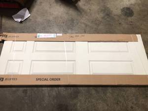 lot 35 image: JELD-WEN 30 in. x 80 in. Colonist Primed Textured Solid Core Molded Composite MDF Interior Door Slab Customer Returns See Pictures