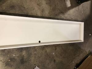 lot 42 image: 2 in. x 8 in.  x 1 in.  primed hardboard Door  Customer Returns See Pictures