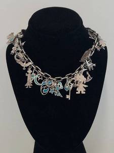lot 73N image: Sterling Silver Navajo Charm Necklace with Turquoise Charms, 26.5 Inches