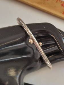 lot 95N image: Sterling Silver Cuff Bracelet with Gold Accents, Unmarked, Elegant Design