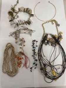 lot 140N image: Assorted Lot of Necklaces and Jewelry Pieces with Various Designs and Materials