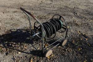 lot 324 image: Garden Hose on Cart Reel