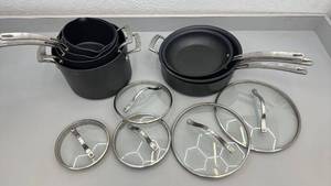 lot 11 image: Kirkland Signature Nonstick Cookware Set with Lids - 4 pots, 3 pans, 5 lids - usedlike new