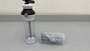 lot 31 image: OXO Cookie Press with 16 Stainless Steel Discs and Storage Case