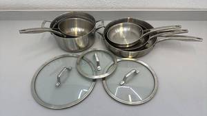 lot 121 image: Calphalon Stainless Steel Cookware Set with Glass Lids - 5 Pots and Pans - used condition