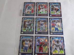 lot 12 image: 9 Donruss Optic Prizm...