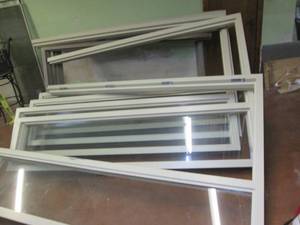 lot 203 image: Commercial metal door frames with a...