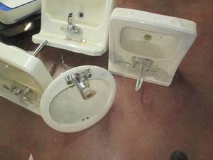 lot 225 image: Four assorted porcelain sinks with ...