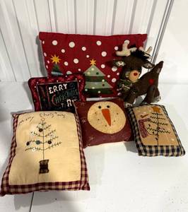 lot 18 image: Set of 5 Christmas Pillows and Plush Reindeer Dcor