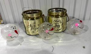 lot 37 image: Merry and Joy Gold Candleholders with Frosted Snowman Lights