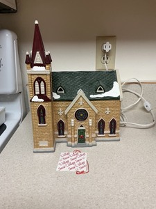 lot 72 image: Lighted Ceramic Christmas Church With Stained Glass Design