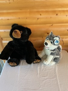 lot 89 image: Plush Stuffed Black Bear and Husky Dog Duo