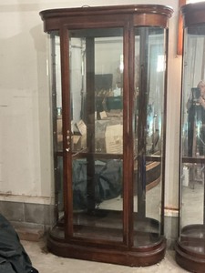 Howard Miller Curved Glass Curio Cabinet with Light and Key