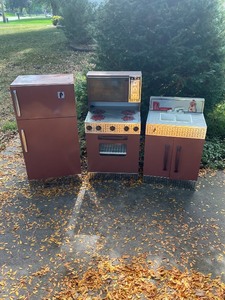 lot 38 image: Vintage Metal Play Kitchen Set with Stove, Sink, and Refrigerator