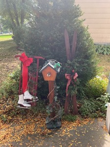 lot 39 image: Outdoor Holiday Decor With Sled, Skis, Birdhouse, and Ice Skates