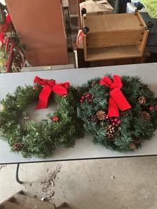 lot 42 image: Two Artificial Holiday Wreaths with Pinecones and Red Bows
