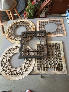 lot 51 image: Cast Iron Heating Grates and Vent Covers