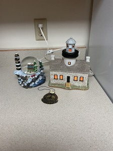 lot 71 image: Lighthouse Figurine Collection With Snow Globe and Ornament