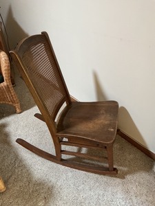 lot 83 image: Wooden Rocking Chair with Cane Back