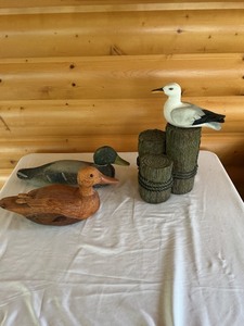 lot 122 image: Three Painted Wooden Bird and Duck Decoys with Dock Display