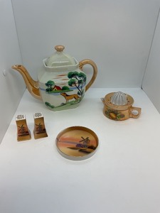 lot 139 image: Hand-Painted Porcelain Tea Set with Landscape and Animal Motif