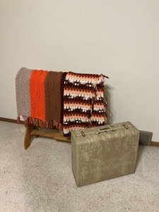 lot 150 image: Quilt Rack with 2 Quilts and Vintage Suitcase