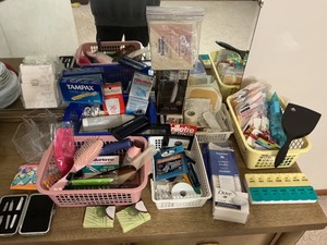 lot 154 image: Giant Assortment of Bathroom and Self-Care Items Including Combs, Cotton Swabs, and Razor Blades
