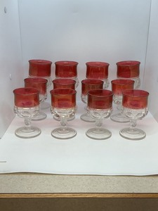 lot 162 image: 12 Cranberry Glass Thumbprint Goblets