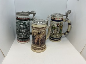 lot 193 image: Three Ceramic and Pewter Steins, Made in Germany and Brazil, 1982-1999
