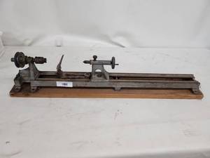 lot 40 image: Vintage Metal Mini Lathe on Wooden Base