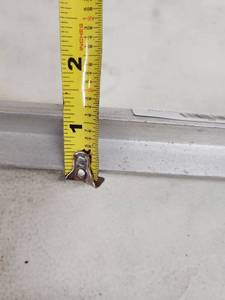 lot 49 image: Lot of Metal Shelving Supports and Brackets and Aluminum Angle Iron