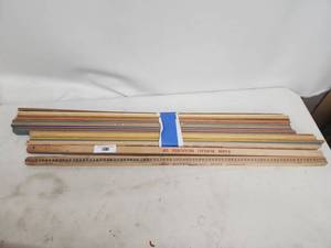 lot 50 image: Collection of Vintage Yardsticks