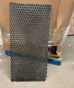 lot 12 image: Hard Rubber Grate 2x3