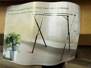 lot 38 image: X-Type Installation Free Stainless Steel Clothes Hanger