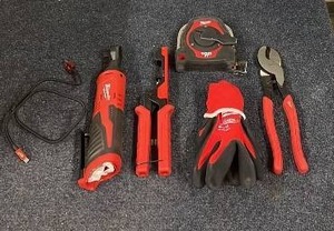 lot 45 image: Milwaukee Ratchet and Hand Tool Set with Tape Measure and Gloves