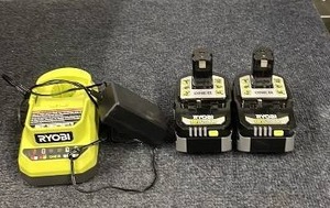 lot 63 image: Ryobi ONE Battery Charger with 2 18V 4.0Ah Lithium-Ion Batteries