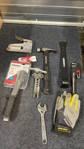 lot 74 image: Lot of Hand Tools Hammer, Staplers, Pipe Wrench, Crowbar, Pliers, Wrench, Gloves
