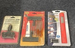 lot 76 image: Auto System Analyzer, Tire Repair Kit, and Multi-Function Flashlight Set