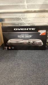 lot 103 image: Ovente Cast-Iron Electric Cooktop with Dual Burners, Unopened