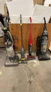 lot 157 image: ted  - Lot of 4 Upright and Stick Vacuums - Bissell, Shark, Dirt Devil
