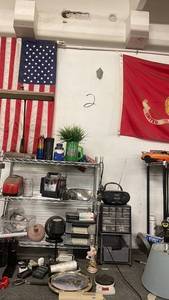 lot 160 image: Mixed Electronics and Household Lot Including Black & Decker Charger, Emergency Jump Starter, Radios, and More